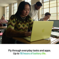 Female user operating the 13-inch MacBook Neo A18 Pro 256GB Citrus in an office environment at Tradeline.