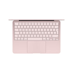Overhead view of the Magic Keyboard with Touch ID on the 13-inch MacBook Neo 512GB Blush at Tradeline.