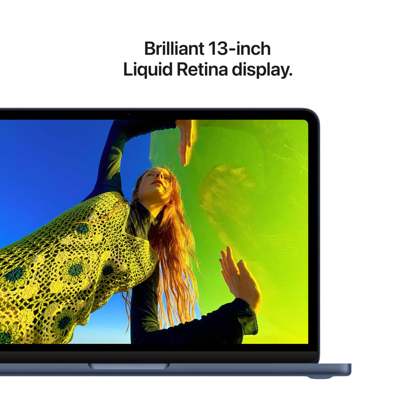 Close-up perspective of the vibrant 13-inch display on the MacBook Neo A18 Pro 512GB Indigo at Tradeline.