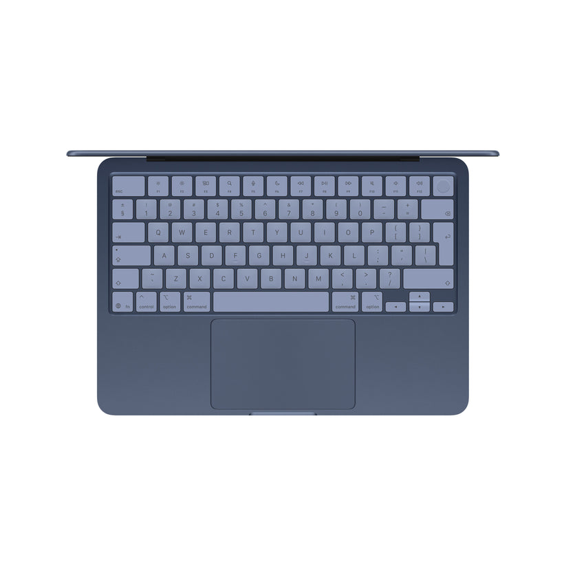 Top-down view showing Magic Keyboard with Touch ID on the 13-inch MacBook Neo 512GB Indigo at Tradeline.